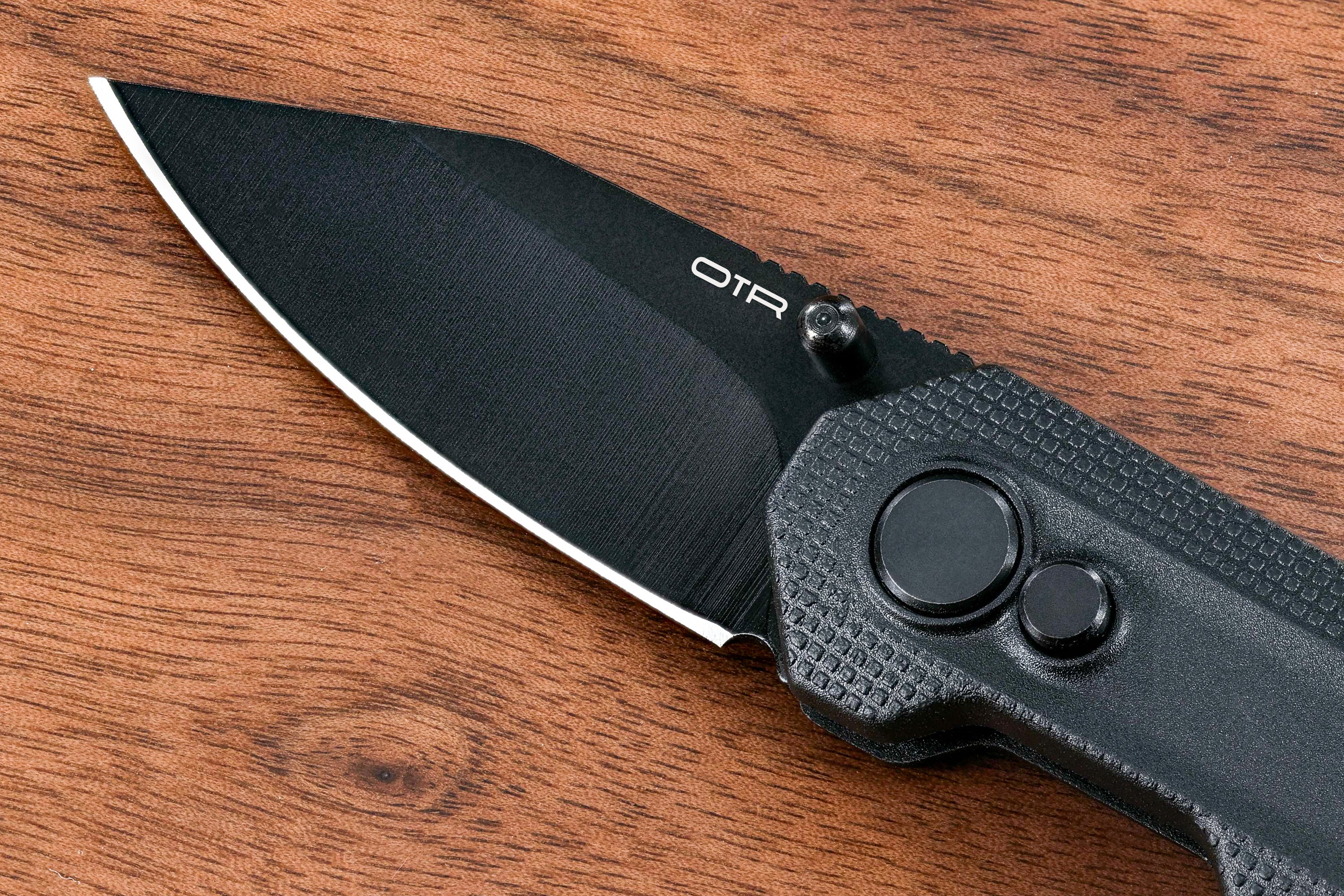 Mini Pocket Knife on Wood