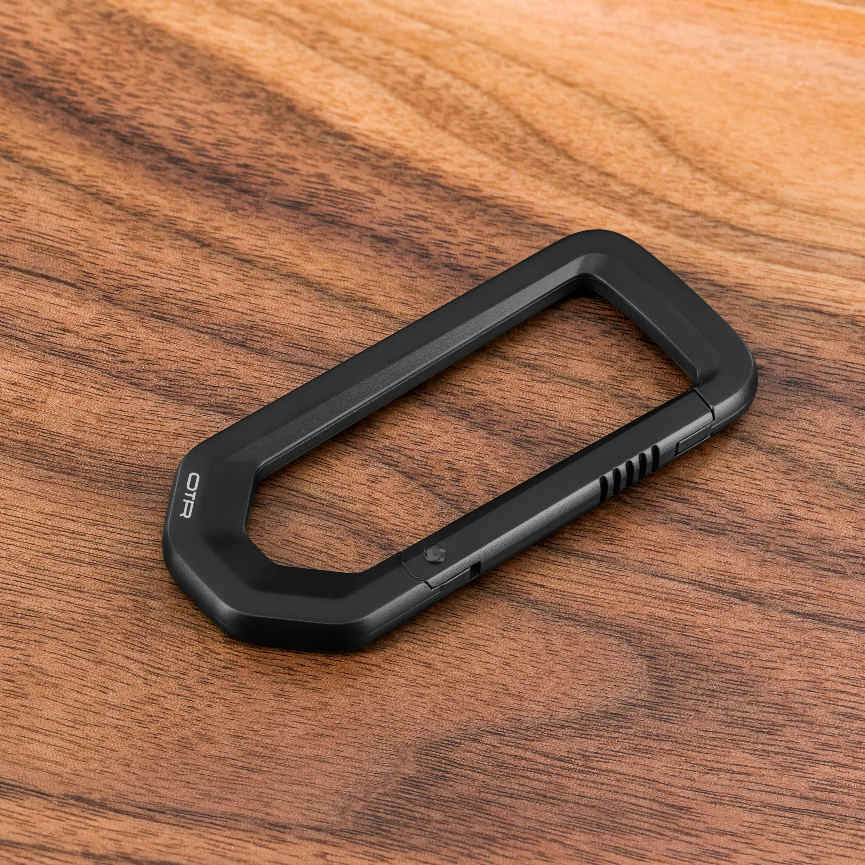 Black Carabiner on Wood