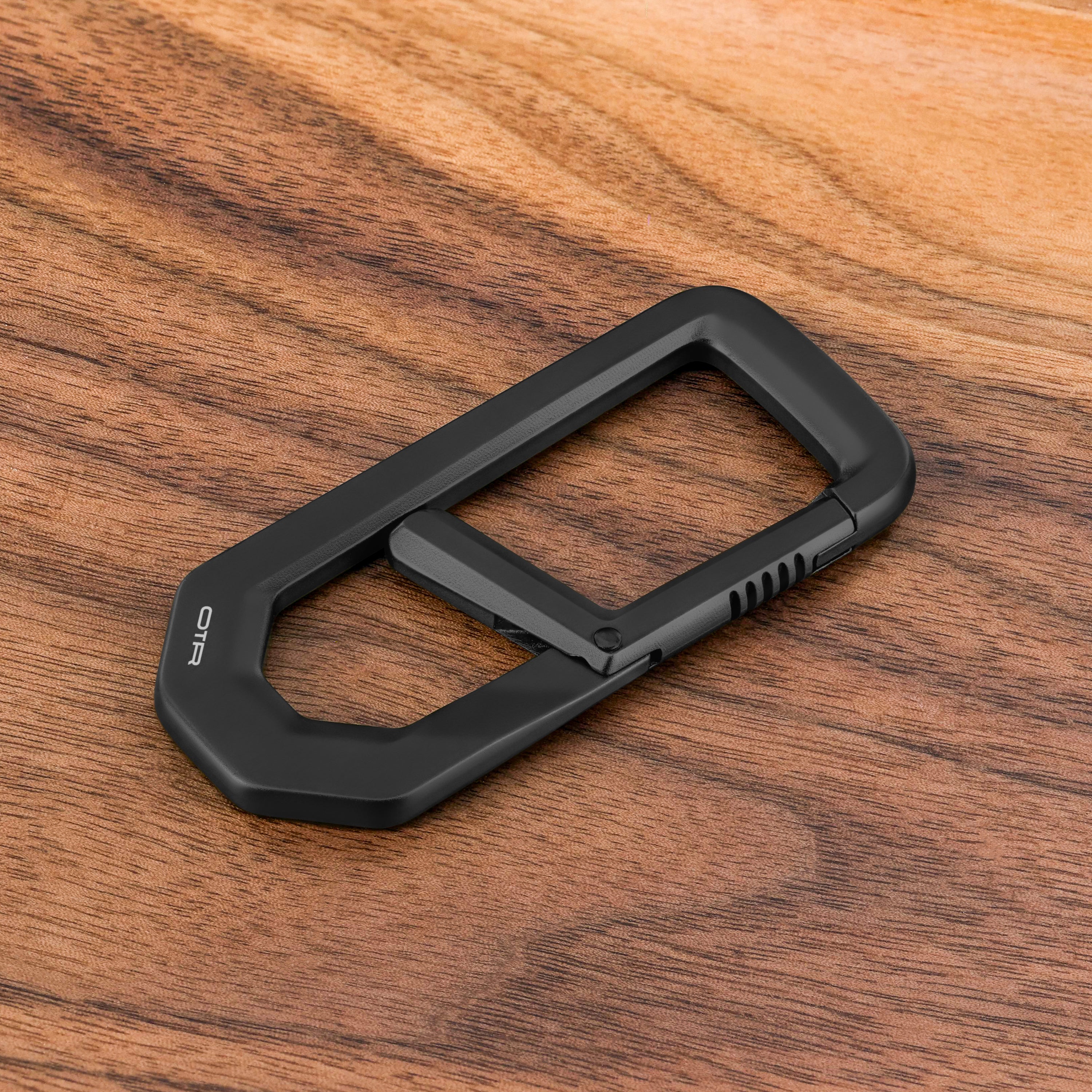 Black H Carabiner on Wood
