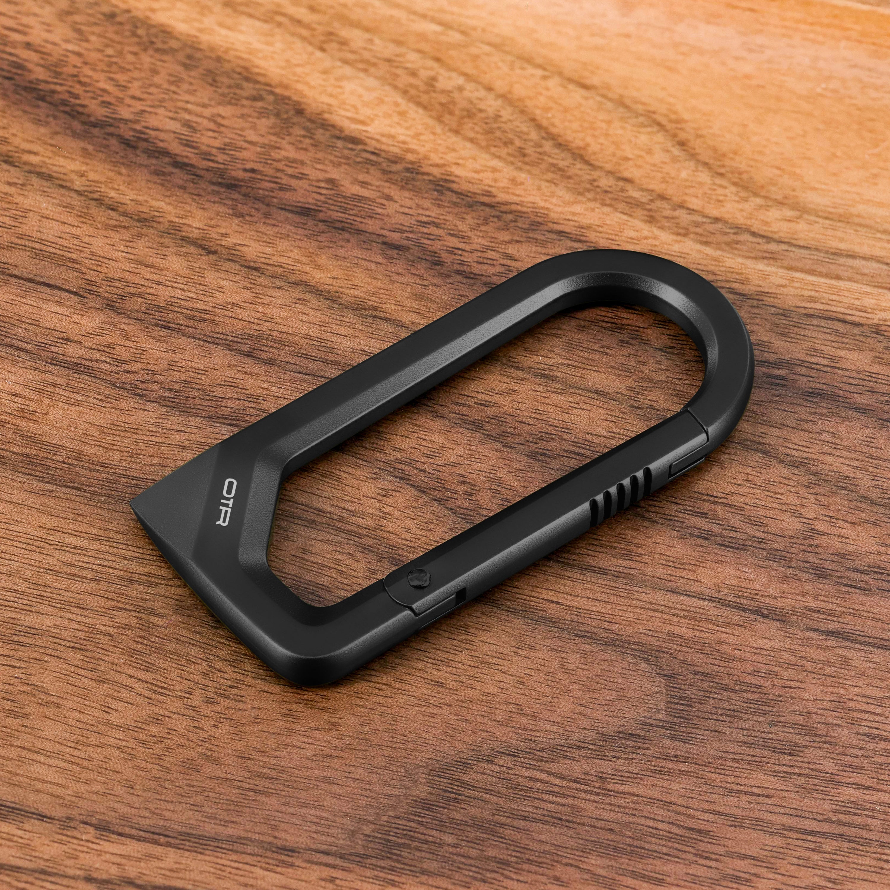 Black Scoring Carabiner on Wood