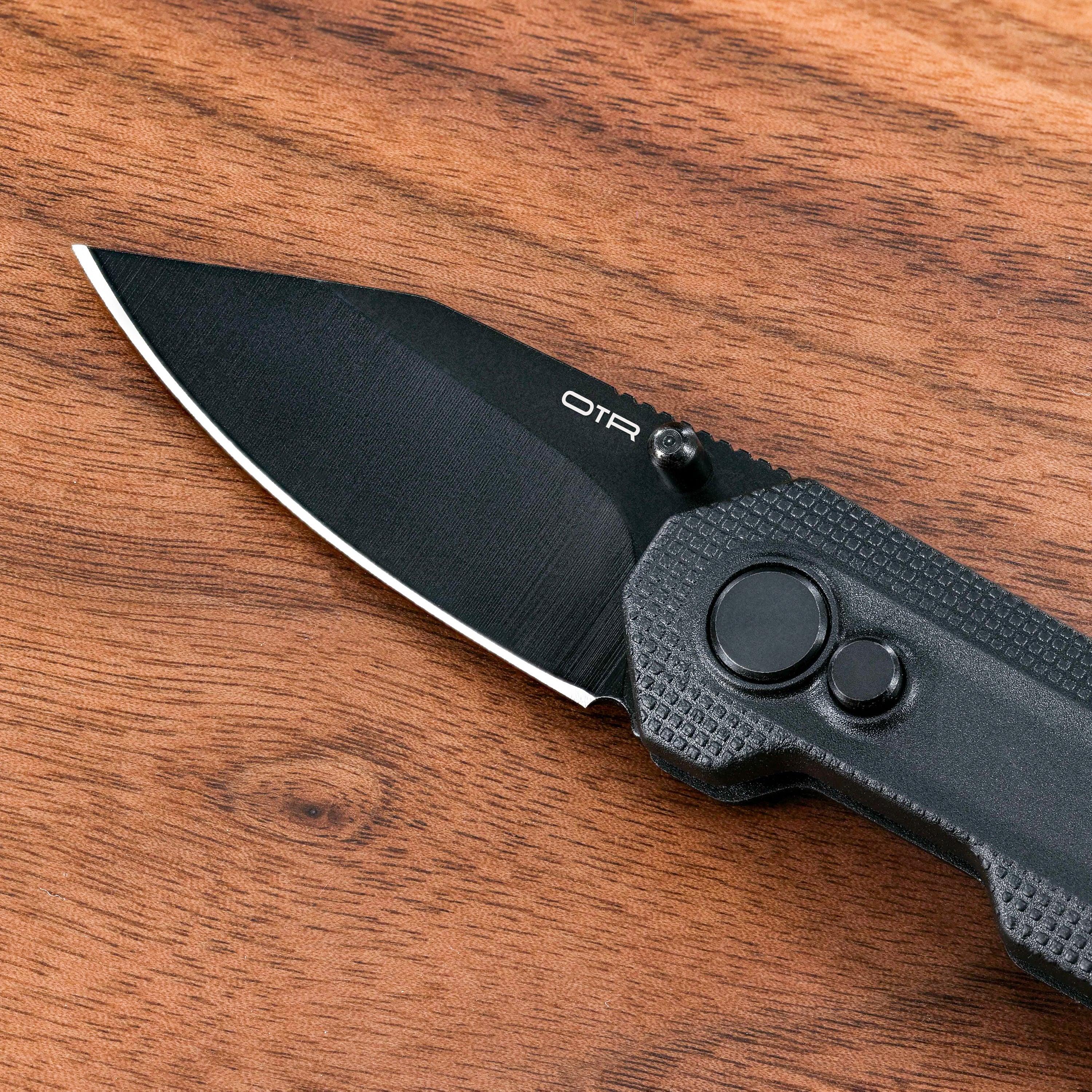 Mini Pocket Knife on Wood