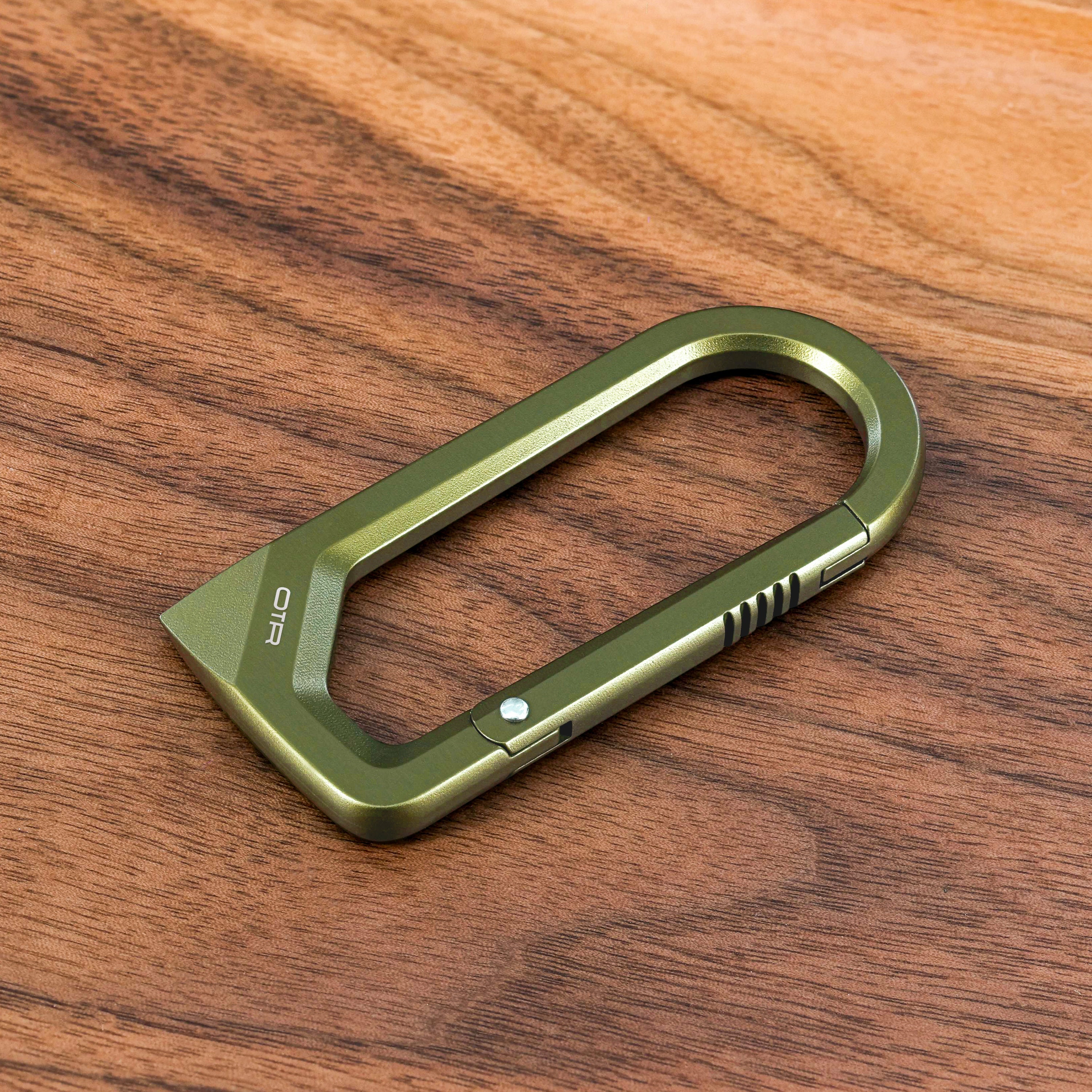 OD Green Scoring Carabiner on Wood